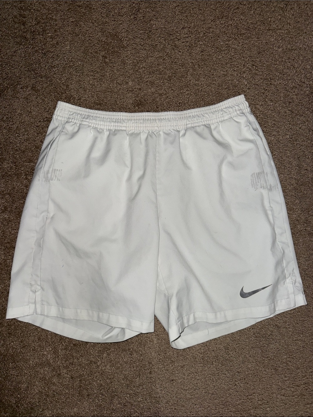 Nike White Athletic Shorts with Gray Swoosh